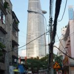 Saigon:  Cables … motorbikes … street stalls … and the Bitexco Tower